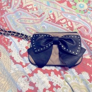 Tab and black Betsy Johnson clutch